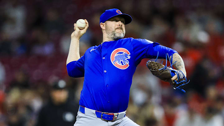 May 23, 2025; Cincinnati, Ohio, USA; Chicago Cubs relief pitcher Ryan Pressly (55) pitches against the Cincinnati Reds in the ninth inning at Great American Ball Park.