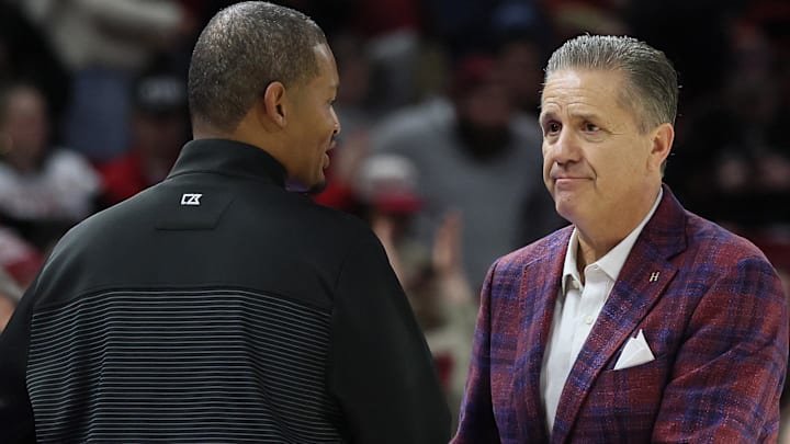 South Carolina Gamecocks head coach Lamont Paris and Arkansas Razorbacks coach John Calipari shake hands after the game at Bud Walton Arena in Fayetteville, Ark.