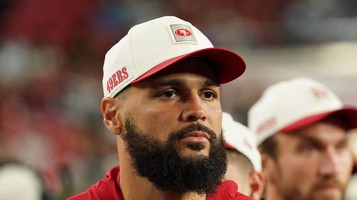 San Francisco 49ers wide receiver Mike Evans watches from the sideline San Francisco 49ers wide receiver Mike Evans watches from the sideline