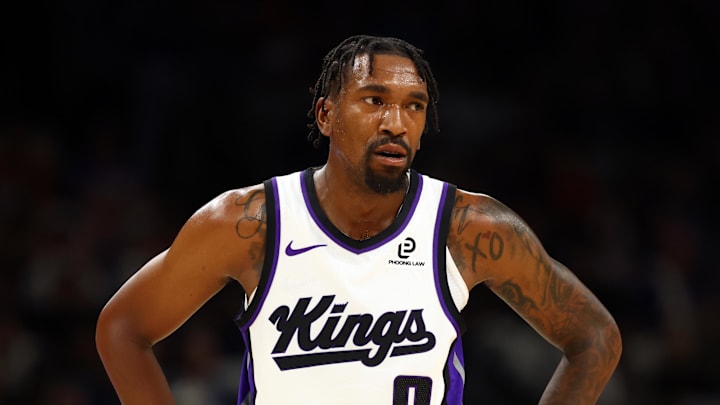 Oct 22, 2025; Phoenix, Arizona, USA; Sacramento Kings guard Malik Monk (0) against the Phoenix Suns at the Mortgage Matchup Center.