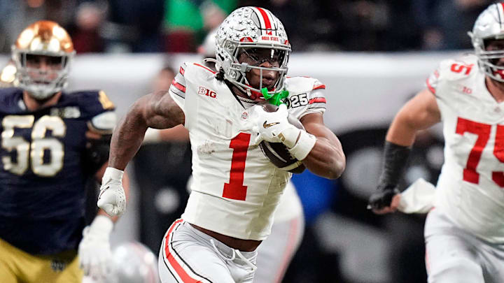 Ohio State Buckeyes running back Quinshon Judkins (1) gets away from the Notre Dame Fighting Irish defense for a long run in the third quarter during the College Football Playoff championship at Mercedes-Benz Stadium in Atlanta on January 20, 2025. Ohio State Buckeyes running back Quinshon Judkins (1) gets away from the Notre Dame Fighting Irish defense for a long run in the third quarter during the College Football Playoff championship at Mercedes-Benz Stadium in Atlanta on January 20, 2025.