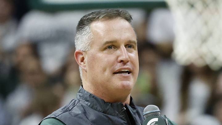 Michigan State Spartans head coach Pat Fitzgerald addresses fans during a men's basketball game against the Iowa Hawkeyes on Tuesday, Dec. 2, 2025, at the Breslin Center. Fitzgerald had been formally introduced earlier that day. Michigan State Spartans head coach Pat Fitzgerald addresses fans during a men's basketball game against the Iowa Hawkeyes on Tuesday, Dec. 2, 2025, at the Breslin Center. Fitzgerald had been formally introduced earlier that day.