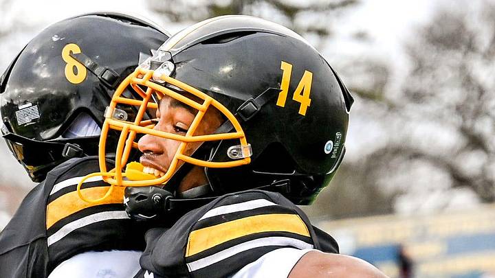 Detroit King's Don Spillers, right, celebrate his touchdown catch with Tay'Shawn Henry during the fourth quarter in the game against Mason on Saturday, Nov. 23, 2024, at Chelsea High School.