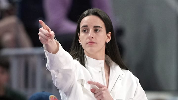 Aug 31, 2025; San Francisco, California, USA; Indiana Fever guard Caitlin Clark (center) gestures after an offensive foul by Golden State Valkyries guard Veronica Burton (foreground right) during the third quarter at Chase Center. Mandatory Credit: Darren Yamashita-Imagn Images Aug 31, 2025; San Francisco, California, USA; Indiana Fever guard Caitlin Clark (center) gestures after an offensive foul by Golden State Valkyries guard Veronica Burton (foreground right) during the third quarter at Chase Center. Mandatory Credit: Darren Yamashita-Imagn Images