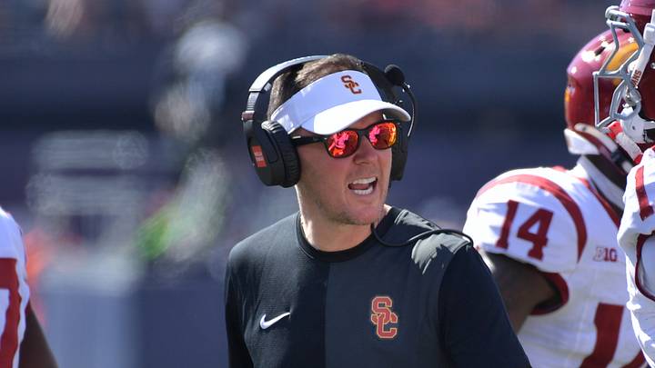 Sep 27, 2025; Champaign, Illinois, USA; Southern California Trojans head coach Lincoln Riley talks with players during the first half against the Illinois Fighting Illini at Memorial Stadium. Sep 27, 2025; Champaign, Illinois, USA; Southern California Trojans head coach Lincoln Riley talks with players during the first half against the Illinois Fighting Illini at Memorial Stadium.