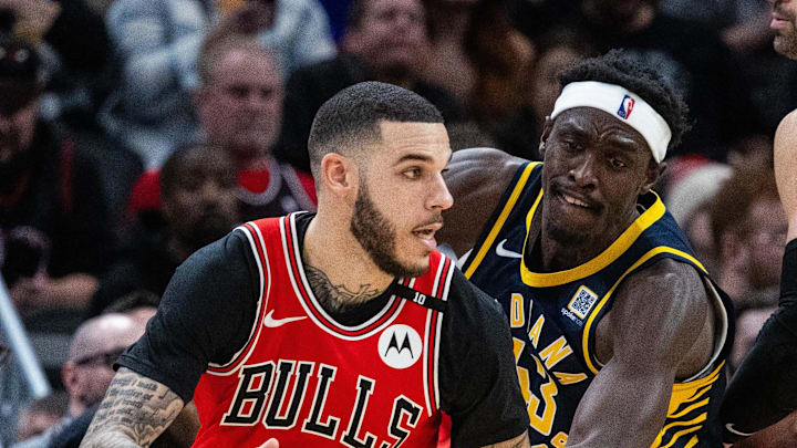 Jan 8, 2025; Indianapolis, Indiana, USA; Chicago Bulls guard Lonzo Ball (2) dribbles the ball while Indiana Pacers forward Pascal Siakam (43) defends in the first half at Gainbridge Fieldhouse. Mandatory Credit: Trevor Ruszkowski-Imagn Images