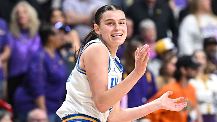 Mar 30, 2025; Spokane, WA, USA; UCLA Bruins guard Gabriela Jaquez (11) celebrates after a three-pointer against the LSU Lady Tigers during the second half of a Elite 8 NCAA Tournament basketball game at Spokane Arena. Mandatory Credit: James Snook-Imagn Images