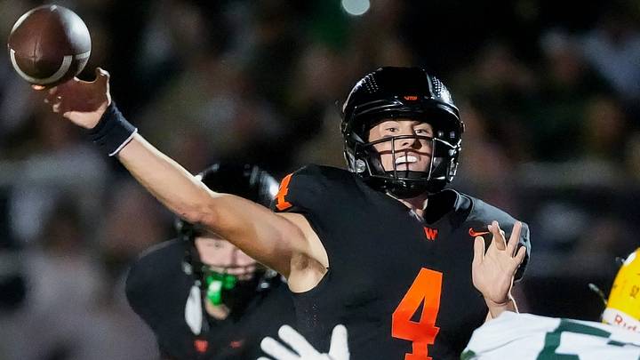 West De Pere quarterback Andrew Greisen (4) passes the ball versus Ashwaubenon in a Fox River Classic Conference (North Division) game on Friday, Sept. 11, 2026. West De Pere quarterback Andrew Greisen (4) passes the ball versus Ashwaubenon in a Fox River Classic Conference (North Division) game on Friday, Sept. 11, 2026.