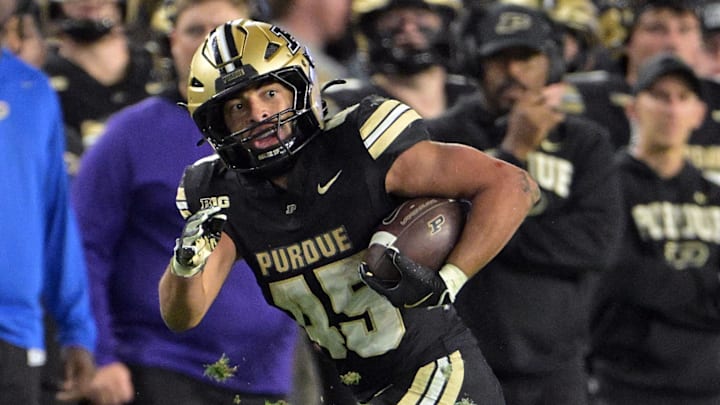 Purdue Boilermakers running back Devin Mockobee (45) runs the ball