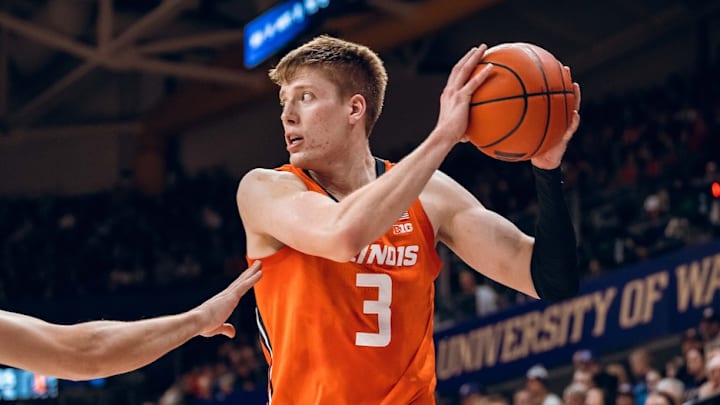 Illinois forward Ben Humrichous (3) protects the ball in the Illini's 80-77 win over Washington on Sunday at Alaska Airlines Arena in Seattle. Illinois forward Ben Humrichous (3) protects the ball in the Illini's 80-77 win over Washington on Sunday at Alaska Airlines Arena in Seattle.