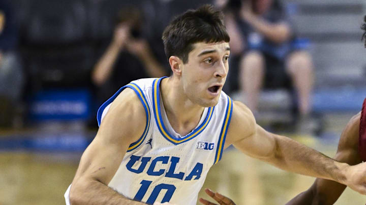 Nov 4, 2024; Los Angeles, California, USA; UCLA Bruins guard Lazar Stefanovic (10) drives to the basket as Rider Broncs guard Flash Burton (11) moves in to defend during the second half at Pauley Pavilion presented by Wescom. Mandatory Credit: Robert Hanashiro-Imagn Images Nov 4, 2024; Los Angeles, California, USA; UCLA Bruins guard Lazar Stefanovic (10) drives to the basket as Rider Broncs guard Flash Burton (11) moves in to defend during the second half at Pauley Pavilion presented by Wescom. Mandatory Credit: Robert Hanashiro-Imagn Images