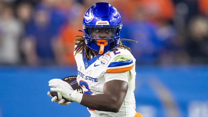 Dec 31, 2024; Glendale, AZ, USA; Boise State Broncos running back Ashton Jeanty (2) against the Penn State Nittany Lions during the Fiesta Bowl at State Farm Stadium. Mandatory Credit: Mark J. Rebilas-Imagn Images