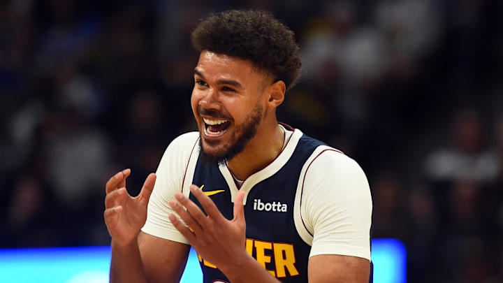 Oct 25, 2025; Denver, Colorado, USA; Denver Nuggets forward Cameron Johnson (23) reacts after being called for a foul during the first half against the Phoenix Suns at Ball Arena. Mandatory Credit: Christopher Hanewinckel-Imagn Images