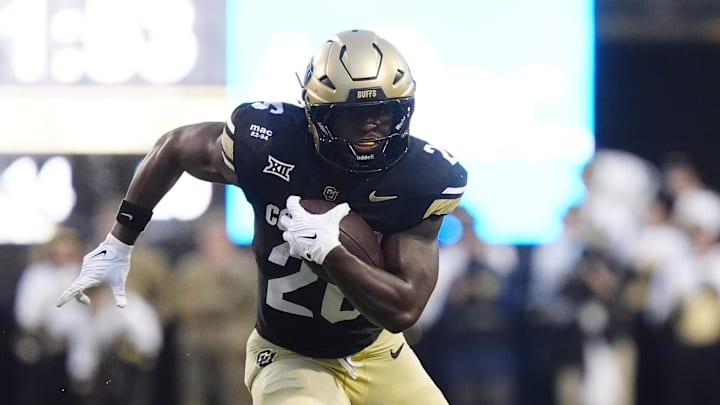 Aug 29, 2025; Boulder, Colorado, USA; Colorado Buffaloes running back Simeon Price (26) carries the ball in the second quarter against the Georgia Tech Yellow Jackets at Folsom Field. Mandatory Credit: Ron Chenoy-Imagn Images