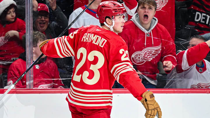Dec 21, 2025; Detroit, Michigan, USA; Detroit Red Wings left wing Lucas Raymond (23) celebrates his goal during the second period against the Washington Capitals at Little Caesars Arena. Mandatory Credit: Tim Fuller-Imagn Images Dec 21, 2025; Detroit, Michigan, USA; Detroit Red Wings left wing Lucas Raymond (23) celebrates his goal during the second period against the Washington Capitals at Little Caesars Arena. Mandatory Credit: Tim Fuller-Imagn Images