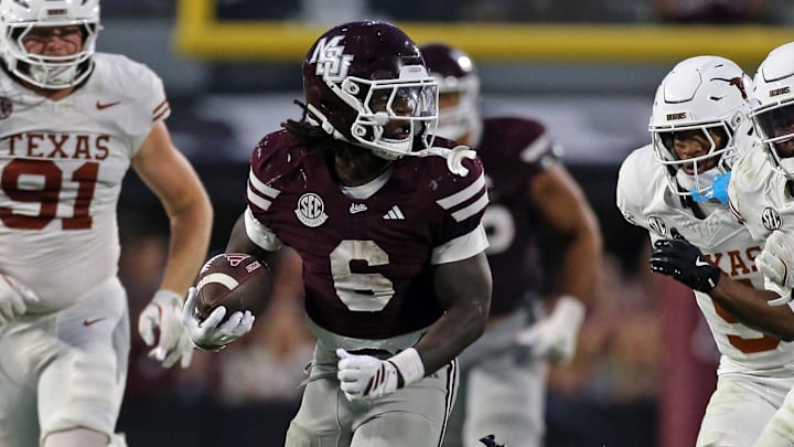 Mississippi State Bulldogs running back Davon Booth (6) runs after a catch for a touchdown during the fourth quarter against the Texas Longhorns at Davis Wade Stadium at Scott Field.