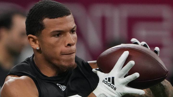 Receiver Skyy Moore goes through drills during the 2022 NFL Scouting Combine. Receiver Skyy Moore goes through drills during the 2022 NFL Scouting Combine.