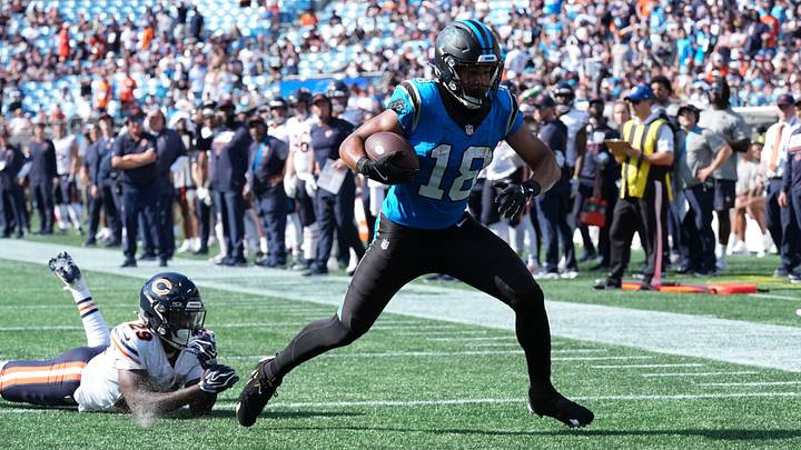 Sep 13, 2026; Charlotte, North Carolina, USA; Carolina Panthers wide receiver Jalen Coker (18) runs the ball for a touchdown in the fourth quarter against the Chicago Bears at Bank of America Stadium. Mandatory Credit: Jim Dedmon-Imagn Images Sep 13, 2026; Charlotte, North Carolina, USA; Carolina Panthers wide receiver Jalen Coker (18) runs the ball for a touchdown in the fourth quarter against the Chicago Bears at Bank of America Stadium. Mandatory Credit: Jim Dedmon-Imagn Images