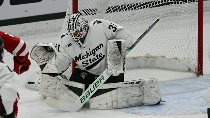 MSU goalie Luca Di Pasquo protects the net against Wisconsin, Thursday, Jan. 2, 2024, at Munn Ice Arena.