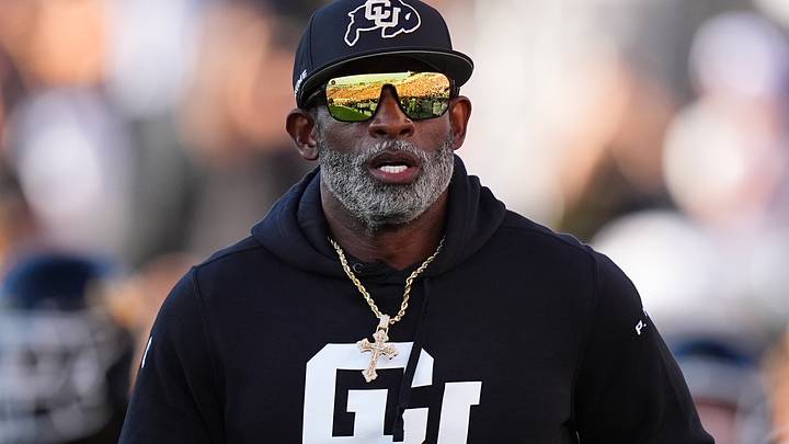 Colorado Buffaloes head coach Deion Sanders runs onto the field before the game against the North Dakota State Bison at Folsom Field. Colorado Buffaloes head coach Deion Sanders runs onto the field before the game against the North Dakota State Bison at Folsom Field.