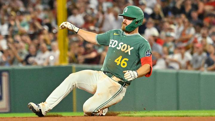 Boston Red Sox catcher Jake Rogers (46) slides Boston Red Sox catcher Jake Rogers (46) slides