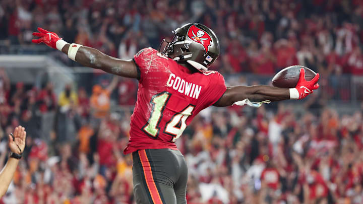 Jan 15, 2024; Tampa, Florida, USA; Tampa Bay Buccaneers wide receiver Chris Godwin (14) celebrates his touchdown against the Philadelphia Eagles during the second half of a 2024 NFC wild card game at Raymond James Stadium. Mandatory Credit: Kim Klement Neitzel-Imagn Images Jan 15, 2024; Tampa, Florida, USA; Tampa Bay Buccaneers wide receiver Chris Godwin (14) celebrates his touchdown against the Philadelphia Eagles during the second half of a 2024 NFC wild card game at Raymond James Stadium. Mandatory Credit: Kim Klement Neitzel-Imagn Images