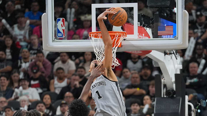 Mar 8, 2026; San Antonio, Texas, USA;  San Antonio Spurs forward Victor Wembanyama (1) blocks a shot by Houston Rockets forward Tari Eason (17) in the second half at Frost Bank Center. Mandatory Credit: Daniel Dunn-Imagn Images