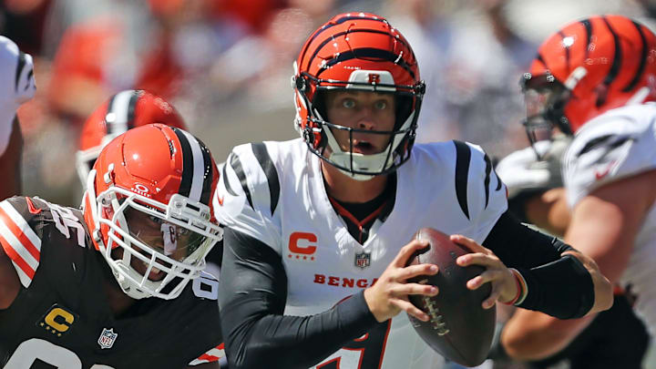Cleveland Browns defensive end Myles Garrett (95) chases down Cincinnati Bengals quarterback Joe Burrow (9) during the first half of an NFL football game at Huntington Bank Field, Sept. 7, 2025, in Cleveland, Ohio.