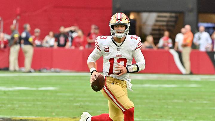 Nov 16, 2025; Glendale, Arizona, USA; San Francisco 49ers quarterback Brock Purdy (13) looks to throw the ball in the first half against the Arizona Cardinals at State Farm Stadium. Mandatory Credit: Matt Kartozian-Imagn Images