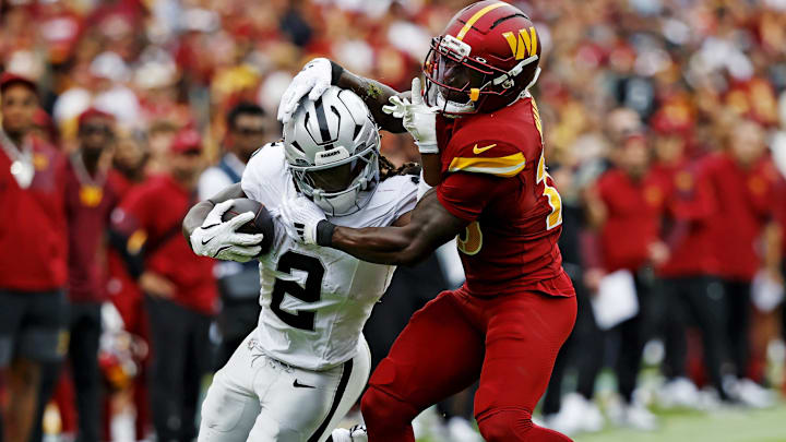 Sep 21, 2025; Landover, Maryland, USA; Las Vegas Raiders running back Ashton Jeanty (2) runs the ball during the second half against the Washington Commanders at Northwest Stadium. Mandatory Credit: Geoff Burke-Imagn Images