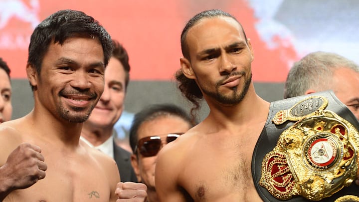 Jul 19, 2019; Las Vegas, NV, USA; Manny Pacquiao (left) and Keith Thurman pose after weighing in for their WBA welterweight world title boxing fight against at MGM Grand Garden Arena. Mandatory Credit: Joe Camporeale-Imagn Images