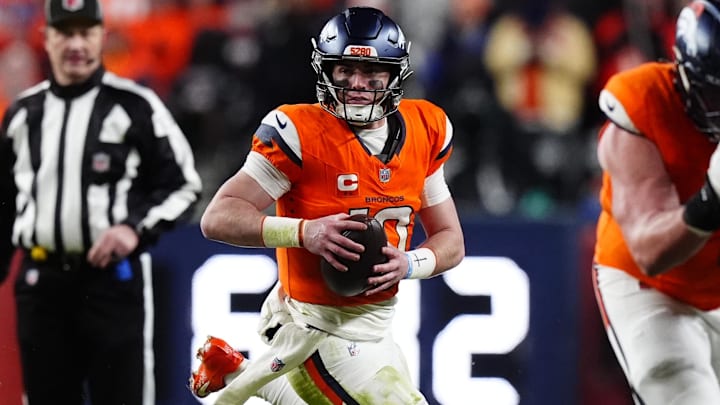 Jan 17, 2026; Denver, CO, USA; Denver Broncos quarterback Bo Nix (10) scrambles during overtime of an AFC Divisional Round playoff game against the Buffalo Bills at Empower Field at Mile High. 