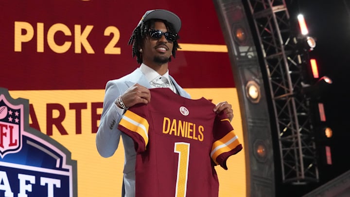 Apr 25, 2024; Detroit, MI, USA; LSU Tigers quarterback Jayden Daniels poses after being selected by