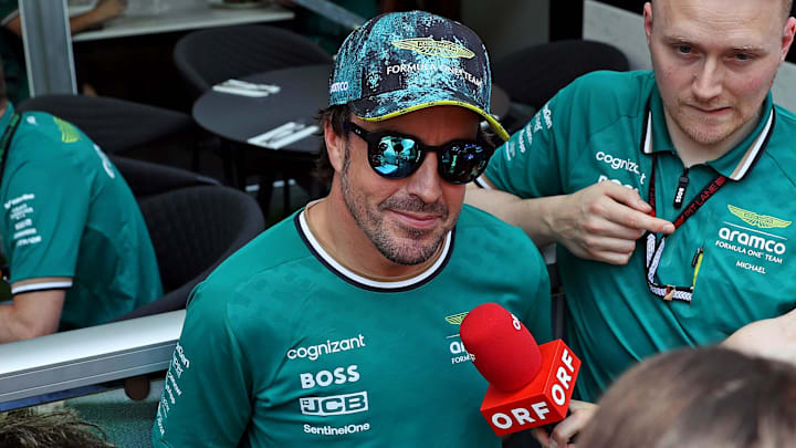 May 2, 2024; Miami Gardens, Florida, USA; Aston Matrin driver Fernando Alonso (14) speaks to the