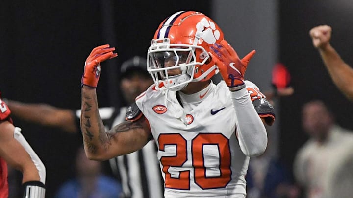 Aug 31, 2024; Atlanta, Georgia, USA; Clemson Tigers corner back Avieon Terrell (20) reacts after tackling Georgia Bulldogs running back Cash Jones (32) during the first quarter of the 2024 Aflac Kickoff Game at Mercedes-Benz Stadium. Mandatory Credit: Ken Ruinard-Imagn Images