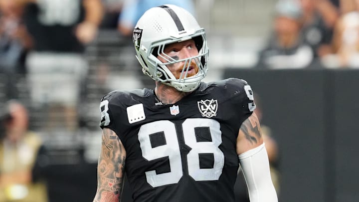 Sep 22, 2024; Paradise, Nevada, USA; Las Vegas Raiders defensive end Maxx Crosby (98) celebrates after getting a sack against the Carolina Panthers during the second quarter at Allegiant Stadium. Mandatory Credit: Stephen R. Sylvanie-Imagn Images