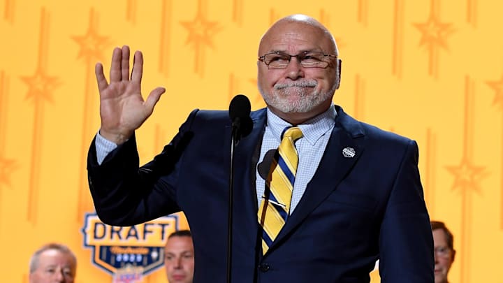 Jun 28, 2023; Nashville, Tennessee, USA; Nashville Predators incoming general manager Barry Trotz announces the twenty fourth pick in round one of the 2023 NHL Draft at Bridgestone Arena. Mandatory Credit: Christopher Hanewinckel-Imagn Images