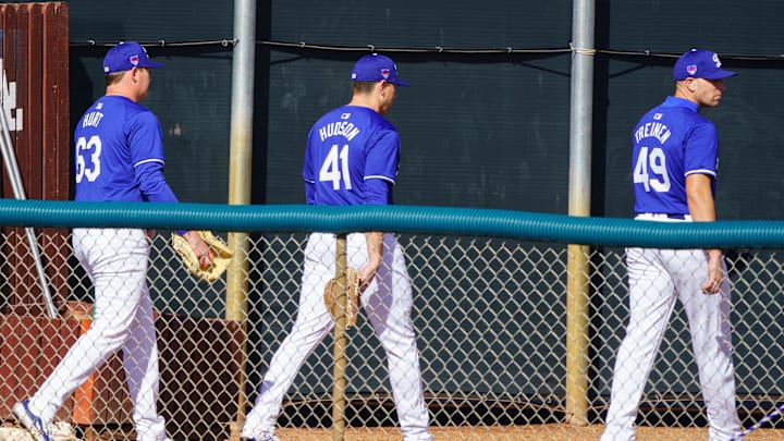 Los Angeles Dodgers pitchers Kyle Hurt (63), Daniel Hudson (41) and Blake Treinen (48) head from the fields to the practice pitching mound at Camelback Ranch for Spring Training Workouts on Feb. 9, 2024.