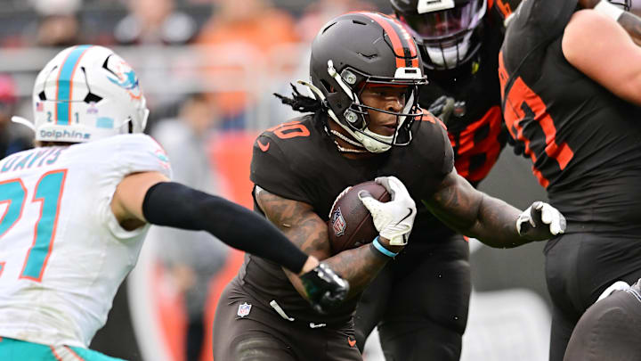 Oct 19, 2025; Cleveland, Ohio, USA; Cleveland Browns running back Quinshon Judkins (10) rushes against Miami Dolphins safety Ashtyn Davis (21) during the second half at Huntington Bank Field. Mandatory Credit: Ken Blaze-Imagn Images Oct 19, 2025; Cleveland, Ohio, USA; Cleveland Browns running back Quinshon Judkins (10) rushes against Miami Dolphins safety Ashtyn Davis (21) during the second half at Huntington Bank Field. Mandatory Credit: Ken Blaze-Imagn Images