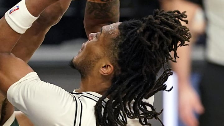 Jan 31, 2025; San Antonio, Texas, USA; San Antonio Spurs guard Stephon Castle (5) drives to the basket against Milwaukee Bucks forward Giannis Antetokounmpo (34) during the first half at Frost Bank Center. Mandatory Credit: Scott Wachter-Imagn Images