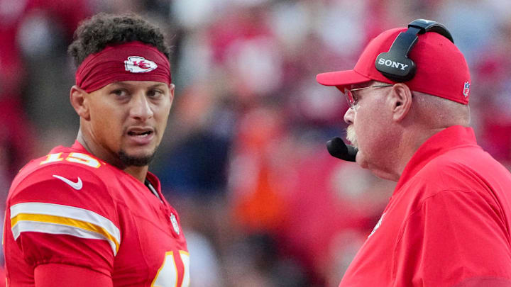 Aug 22, 2025; Kansas City, Missouri, USA; Kansas City Chiefs quarterback Patrick Mahomes (15) talks with head coach Andy Reid after a play against the Chicago Bears during the first half of the game at GEHA Field at Arrowhead Stadium. Mandatory Credit: Denny Medley-Imagn Images