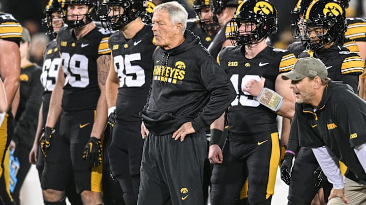 Nov 2, 2024; Iowa City, Iowa, USA; Iowa Hawkeyes head coach Kirk Ferentz watches his team warm up before the game against the Wisconsin Badgers at Kinnick Stadium. Mandatory Credit: Jeffrey Becker-Imagn Images Nov 2, 2024; Iowa City, Iowa, USA; Iowa Hawkeyes head coach Kirk Ferentz watches his team warm up before the game against the Wisconsin Badgers at Kinnick Stadium. Mandatory Credit: Jeffrey Becker-Imagn Images