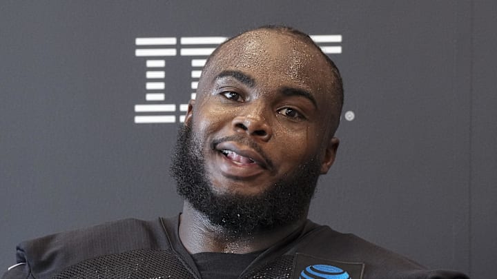 Jul 25, 2024; Buford, GA, USA; Atlanta Falcons defensive end Grady Jarrett (97) talks to the media on the first day of training camp at Falcons Training Camp. Mandatory Credit: Dale Zanine-Imagn Images