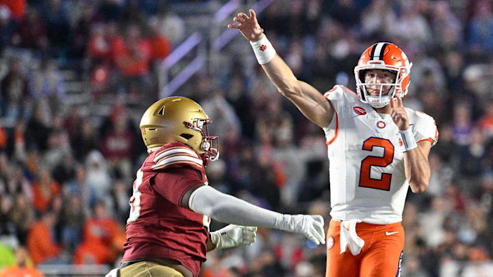 Oct 11, 2025; Chestnut Hill, Massachusetts, USA; Clemson Tigers quarterback Cade Klubnik (2) throws for a Boston College Eagles interception during the second half at Alumni Stadium. Mandatory Credit: Eric Canha-Imagn Images