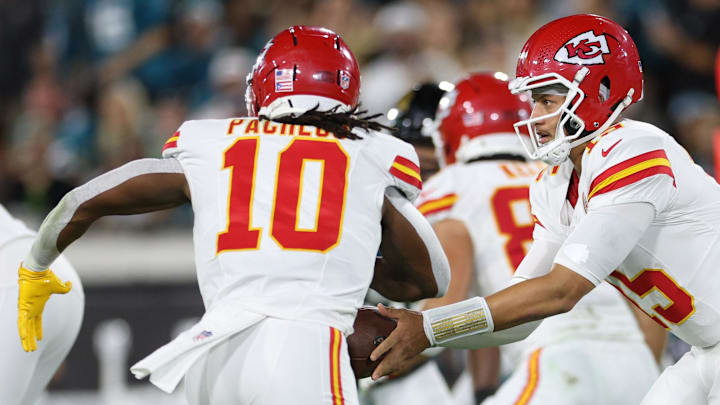 Oct 6, 2025; Jacksonville, Florida, USA; Kansas City Chiefs quarterback Patrick Mahomes (15) hands off to Kansas City Chiefs running back Isiah Pacheco (10) during the first half against the Jacksonville Jaguars at EverBank Stadium. Mandatory Credit: Nathan Ray Seebeck-Imagn Images