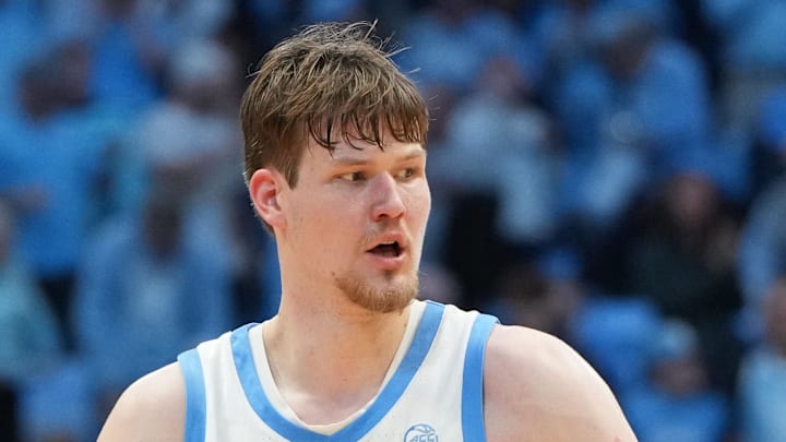 Dec 7, 2025; Chapel Hill, North Carolina, USA; North Carolina Tar Heels center Henri Veesaar (13) reacts with forward Jarin Stevenson (15) after the game at Dean E. Smith Center. Mandatory Credit: Bob Donnan-Imagn Images