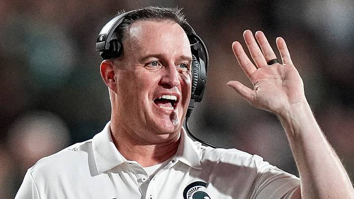 Michigan State head coach Pat Fitzgerald talks to a referee after a play against Toledo during the second half at Spartan Stadium in East Lansing on Friday, Sept. 4, 2026. Michigan State head coach Pat Fitzgerald talks to a referee after a play against Toledo during the second half at Spartan Stadium in East Lansing on Friday, Sept. 4, 2026.