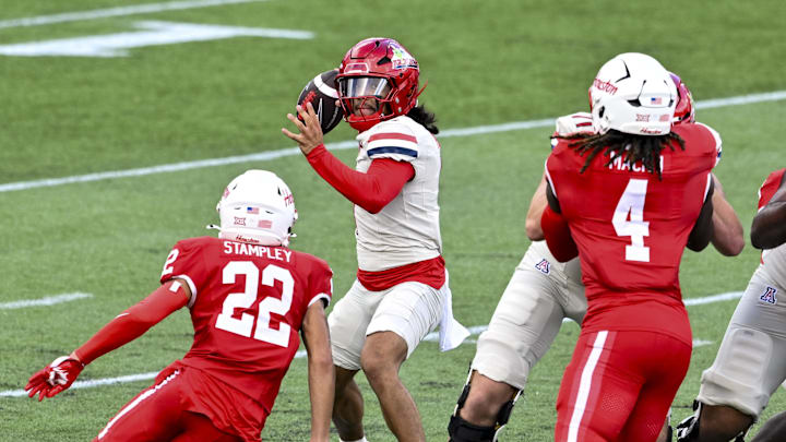 Oct 18, 2025; Houston, Texas, USA; Houston Cougars defensive back Marc Stampley II (22) applies pressure to Arizona Wildcats quarterback Noah Fifita (1) during the first quarter at TDECU Stadium. Mandatory Credit: Maria Lysaker-Imagn Images Oct 18, 2025; Houston, Texas, USA; Houston Cougars defensive back Marc Stampley II (22) applies pressure to Arizona Wildcats quarterback Noah Fifita (1) during the first quarter at TDECU Stadium. Mandatory Credit: Maria Lysaker-Imagn Images