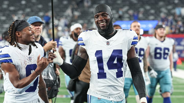 Dallas Cowboys wide receiver KaVontae Turpin and safety Markquese Bell celebrate after a game against the New York Giants.