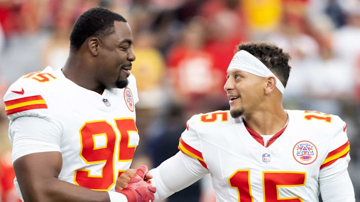 Aug 9, 2025; Glendale, Arizona, USA; Kansas City Chiefs defensive tackle Chris Jones (95) with quarterback Patrick Mahomes (15) against the Arizona Cardinals during a preseason NFL game at State Farm Stadium. Mandatory Credit: Mark J. Rebilas-Imagn Images Aug 9, 2025; Glendale, Arizona, USA; Kansas City Chiefs defensive tackle Chris Jones (95) with quarterback Patrick Mahomes (15) against the Arizona Cardinals during a preseason NFL game at State Farm Stadium. Mandatory Credit: Mark J. Rebilas-Imagn Images